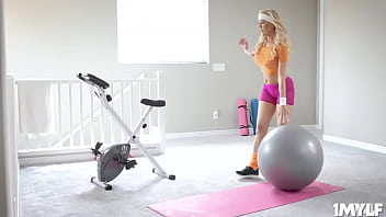 Amazing Milf Workouts While Riding A Pink Dilido On Her Stationary Bike